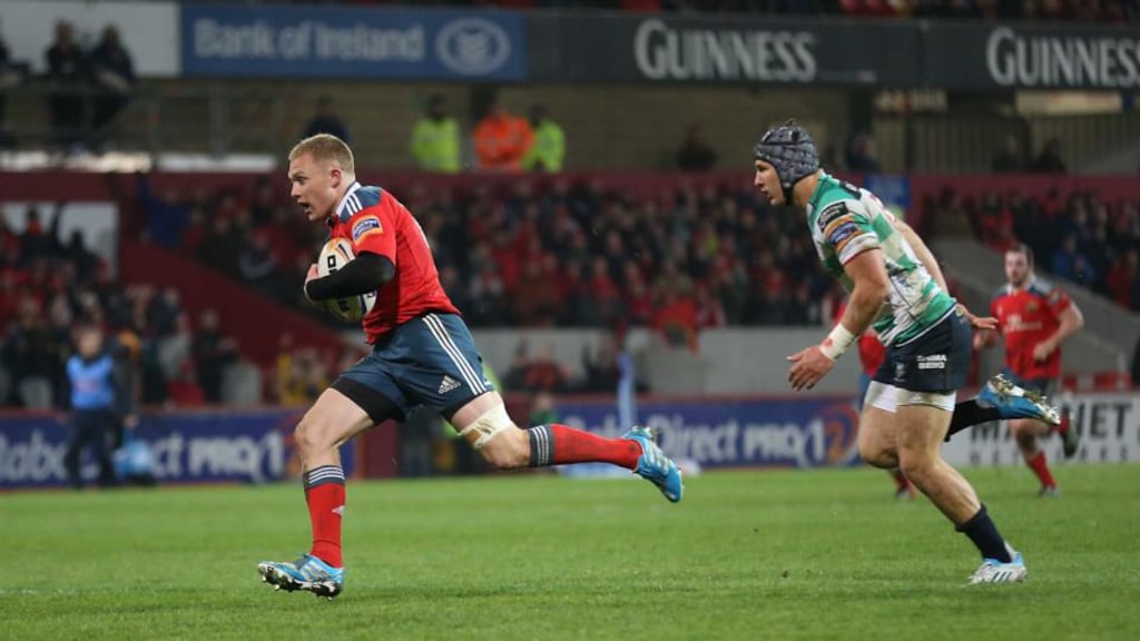 Keith Earls breaks free to score Munster’s opening try in the RaboDirect Pro 12 game against Benetton Treviso at Thomond Park in Limerick. Photograph: Billy Stickland/Inpho