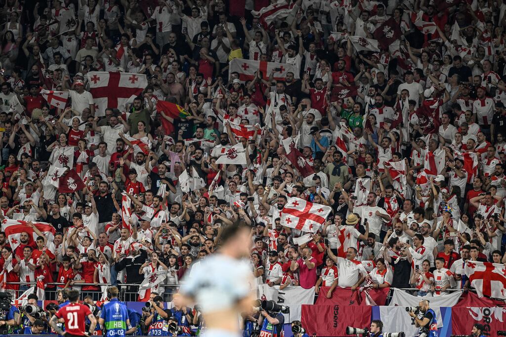 Georgia' supporters celebrate their victory over Portugal at Euro 2024. Photo: Ina Fassbender/AFP via Getty Images