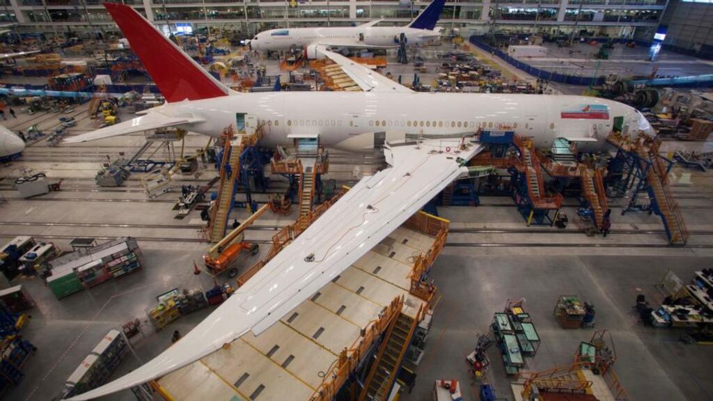 Workers at South Carolina Boeing work on a 787 Dreamliner for Air India at the plant’s final assembly building in North Charleston. Boeing beat its European rival Airbus in net new airplane orders and deliveries in the first quarter. Photo: Reuters