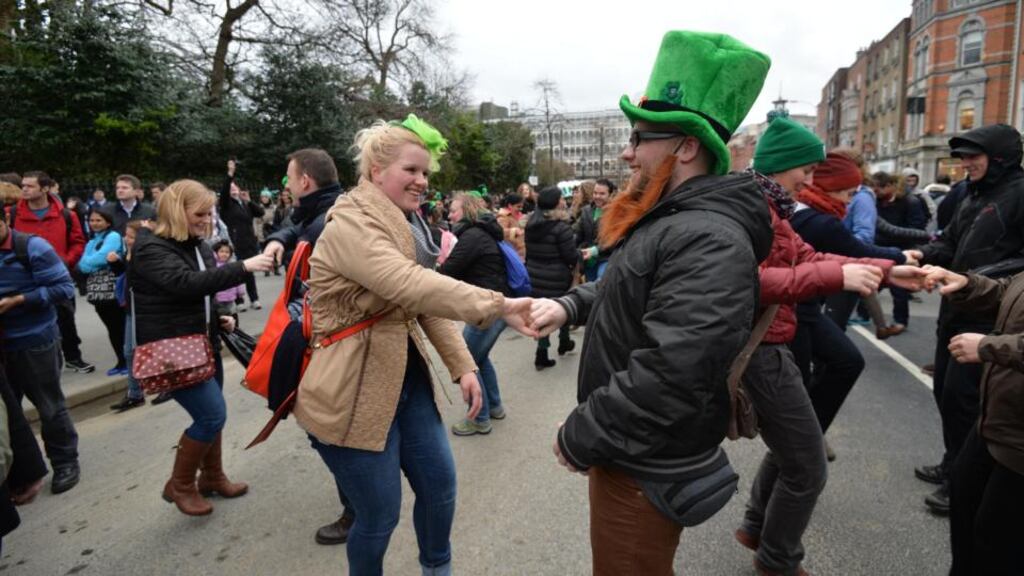 Merle Bukowski and Julian Middeke from Lower Saxony, Germany, enjoying the St Patrick’s Festival Céilí Mór at St Stephen’s Green Dublin. Photograph: Alan Betson/ The Irish Times