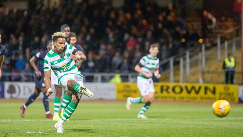 Scott Sinclair scores Celtic’s second in their 5-0 win over Dundee. Photograph: Jeff Holmes/PA