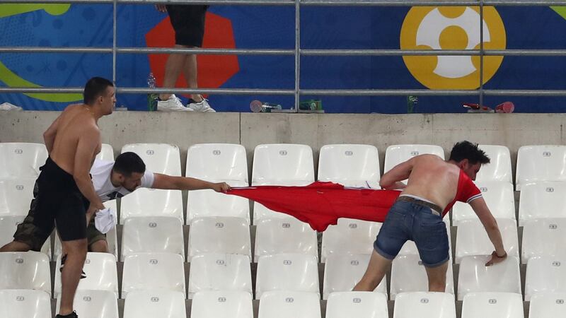 Fans clash during the Euro 2016 match between England and Russia at Stade Velodrome in Marseille, France. Photograph: Lars Baron/Getty Images