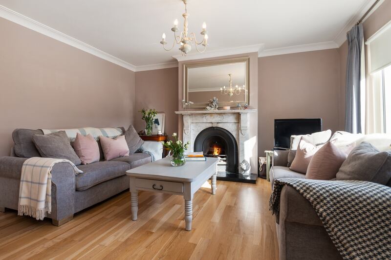 Formal livingroom lies to the front of the property