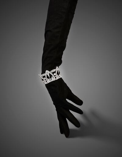 The bejewelled piece in Adam’s sale, which is the property of a titled European woman, works as both a bracelet and headpiece