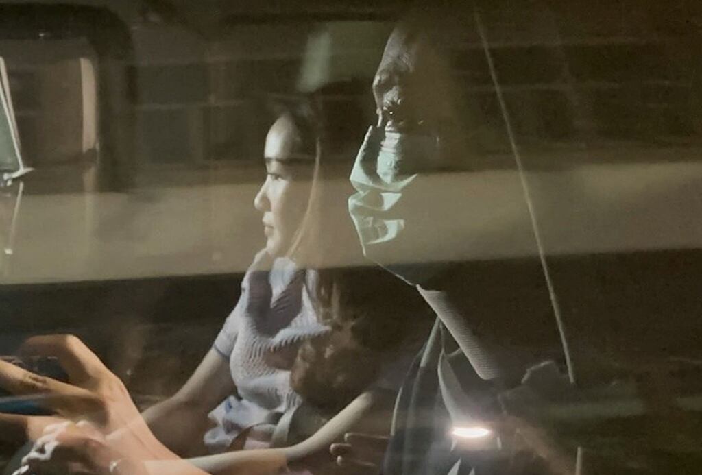 Former Thai PM Thaksin Shinawatra (R) and his daughter Paetongtarn Shinawatra (L) leave Police General Hospital in Bangkok, Thailand. Photograph: EPA