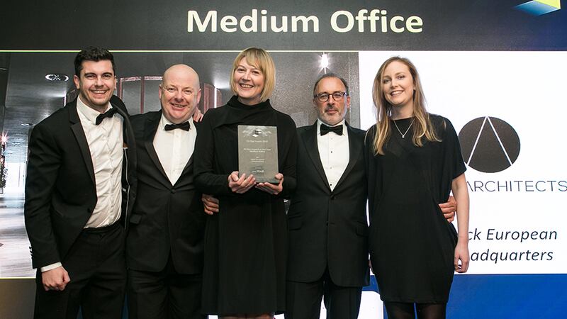 David Cunningham, Director, Knoll International, presents the Fit Out Project of the Year – Medium Office award to the ODOS Architects team