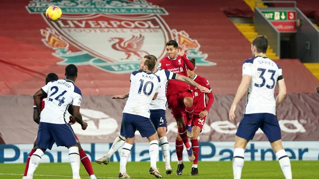 Roberto Firmino heads home Liverpool’s winner in the Premier League game against Tottenham Hotspur at Anfield. Photograph: Jon Super/PA Wire