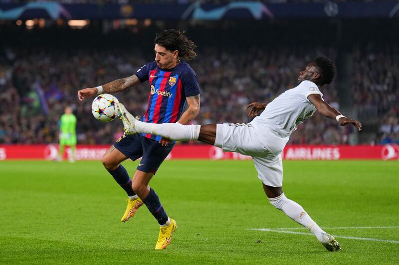 Hector Bellerin of FC Barcelona battles for possession with Alphonso Davies of Bayern Munichduring the UEFA Champions League group in Barcelona, Spain last month. Photograph: Aitor Alcalde/Getty Images