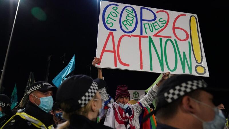 Police and protesters at the entrance of the Scottish Event Campus in Glasgow. Photograph: Andrew Milligan/PA