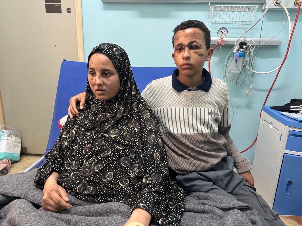 Siblings Amira and Abdullah Abu Teir at the European Gaza Hospital, near Khan Younis, after they were wounded in an air strike that left eight others dead, including their parents and sister. The Abu Teir family thought the Israel-Hamas ceasefire might mean they could start to rebuild their lives. A new round of Israeli air strikes dashed those dreams. Photograph: Bilal Shbair/New York Times