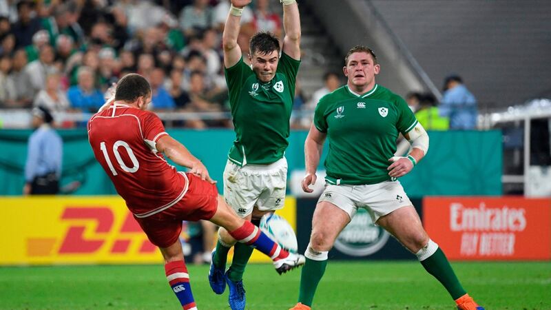 Luke McGrath tries to charge down Russia’s outhalf Ramil Gaisin during Ireland’s win on Kobe. Photograph: Filippo Monteforte/AFP/Getty