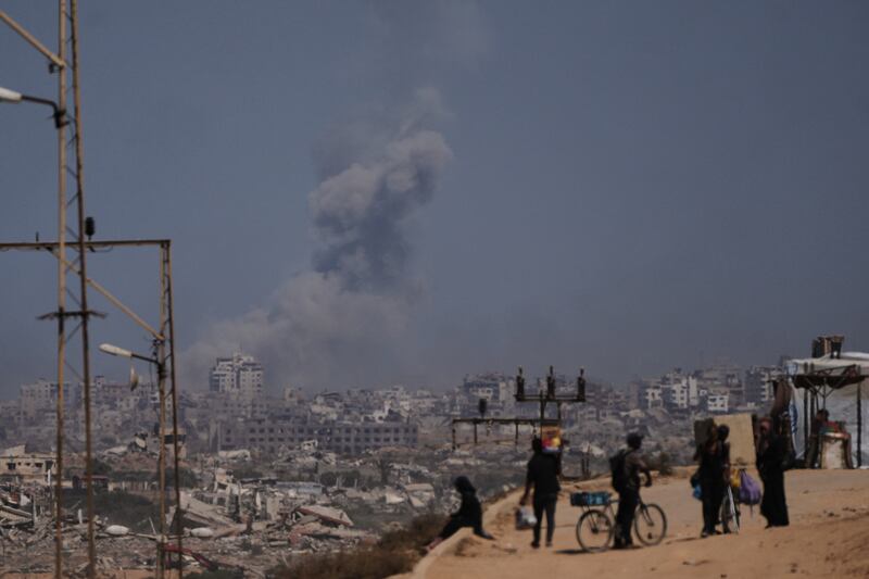 Smoke rises from an Israeli military strike in Gaza City. Photograph: Abdel Kareem Hana/AP