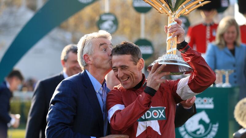 Owner Michael O’Leary and jockey Davy Russell celebrate after Tiger Roll’s victory in the Grand National. Photograph: Mike Egerton/PA Wire