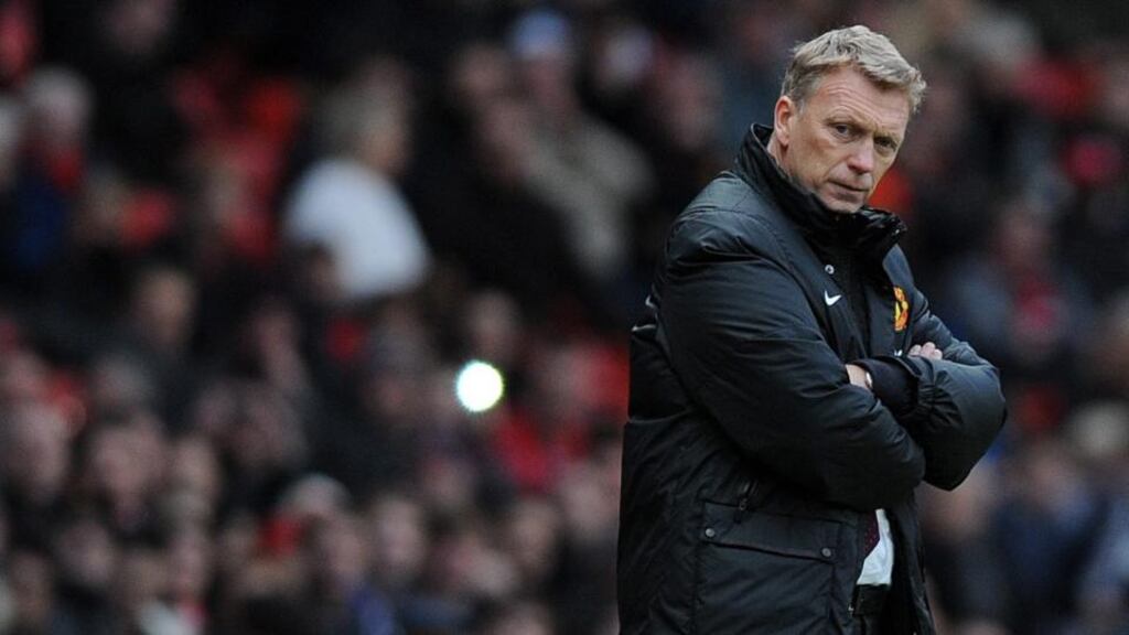 Manchester United manager David Moyes: feeling the heat in the Old Trafford hot zone. Photograph: PA