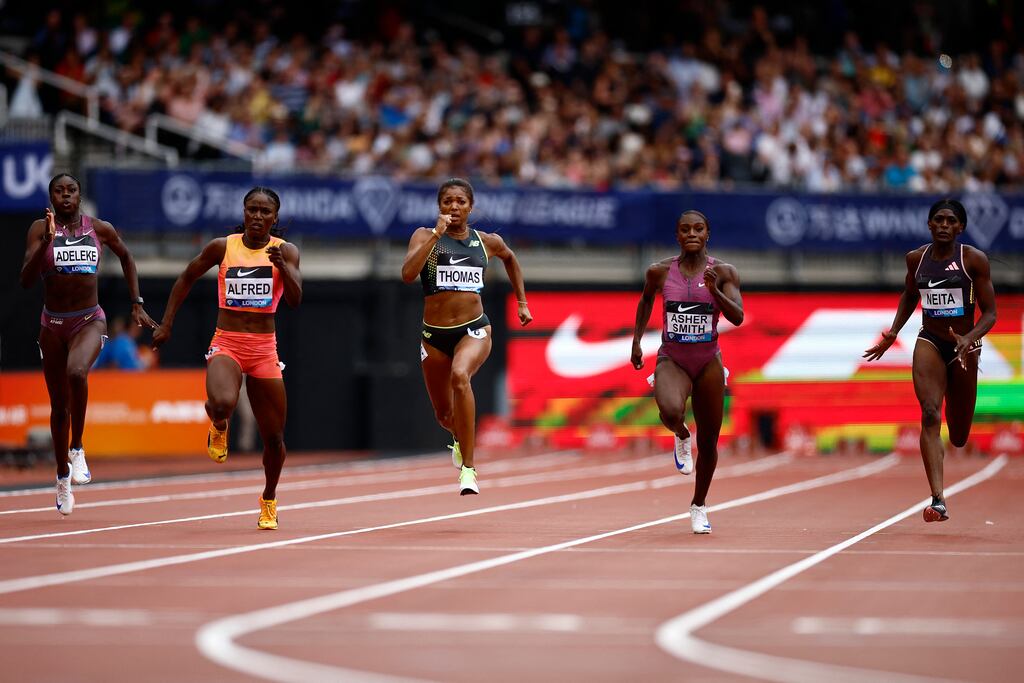 Rhasidat Adeleke (left) of Ireland in action during the women's 200m at the Diamond League meeting at the London Stadium. Gabby Thomas from the US (centre) won the race in a meeting record of 21.82. Photograph: Benjamin Cremel/AFP/Getty Images