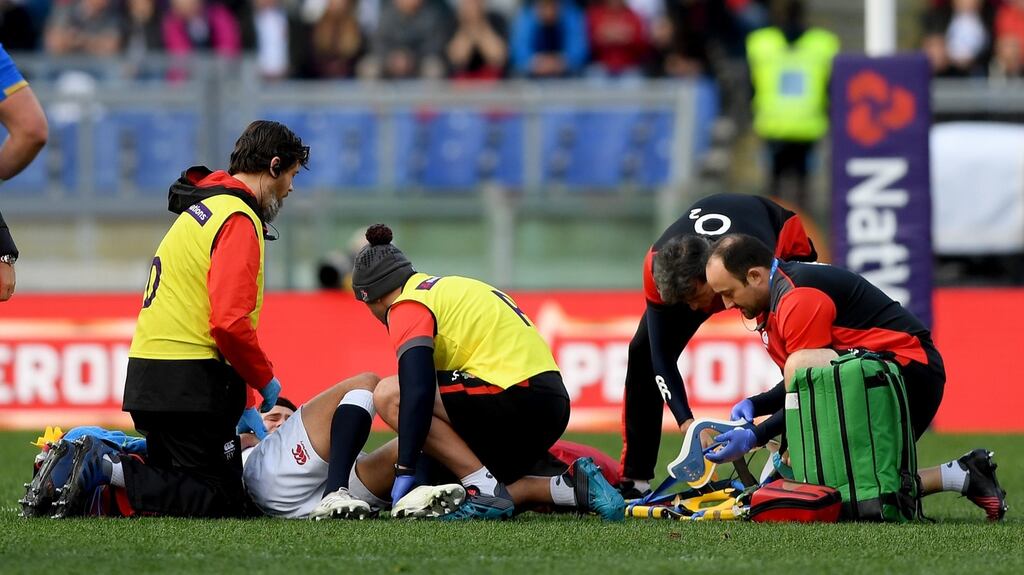 Ben Youngs  recieves   treatment  in Rome. Photograph:  Shaun Botterill/Getty Images