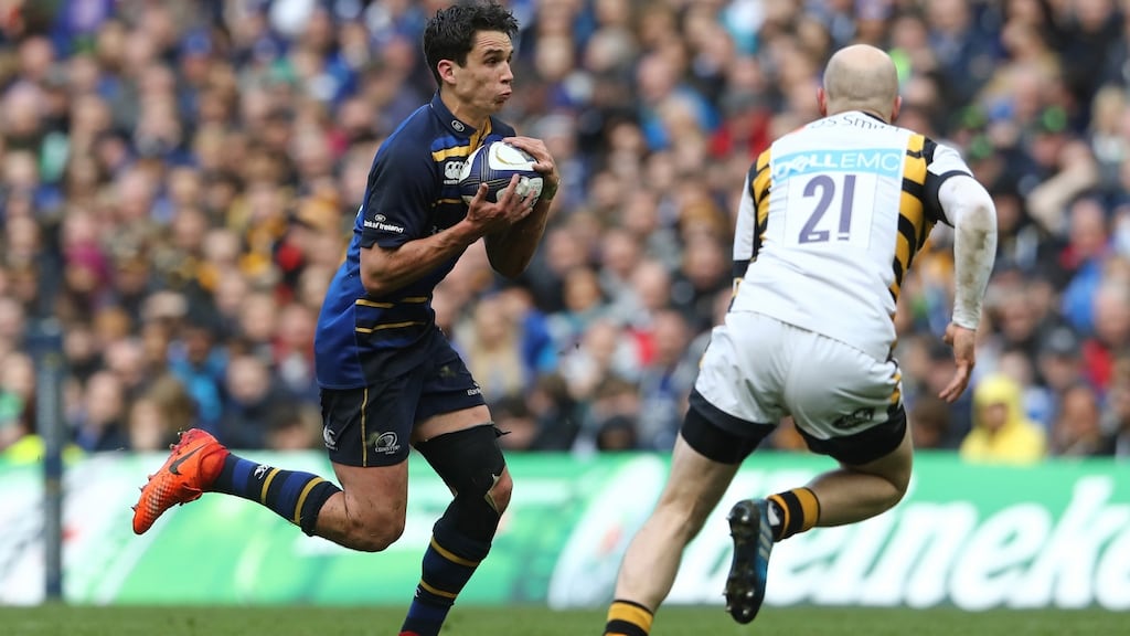 Leinster’s Joey Carbery in full flight against Joe Simpson of Wasps during the Champions Cup quarter-final at the Aviva Stadium. Photograph: David Rogers/Getty Images