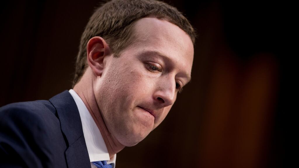 Facebook co-founder Mark Zuckerberg took personal responsibility Tuesday for the leak of data on tens of millions of its users, while warning of an ‘arms race’ against Russian disinformation during a high stakes face-to-face with US lawmakers. Photograph: Brendan Smialowski/AFP
