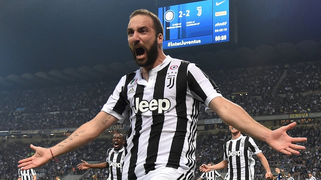 Gonzalo Higuain celebrates his late winner against Inter. Photograph: Alberto Lingria/Reuters
