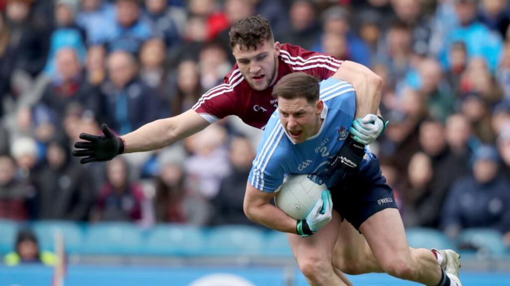 Galway’s Damien Comer keeps a tight rein on Dublin’s Philly McMahon during the Allianz Football League Division One  Final at  Croke Park. Photograph: Oisín Keniry/Inpho