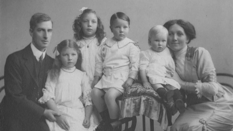 1916 and Me: Alison Badrian’s mother (on her father’s lap) with her family around 1914. Photograph: Family collection