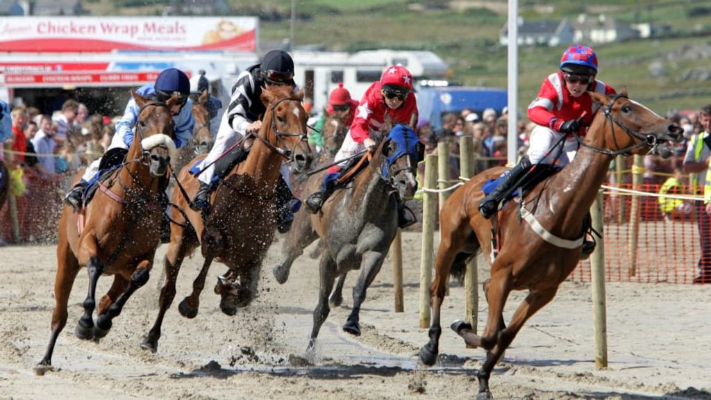 Riders and horses round the bend during the Omey Derby at the Omey Races in Connemara yesterday. Photograph: Joe O’Shaughnessy.