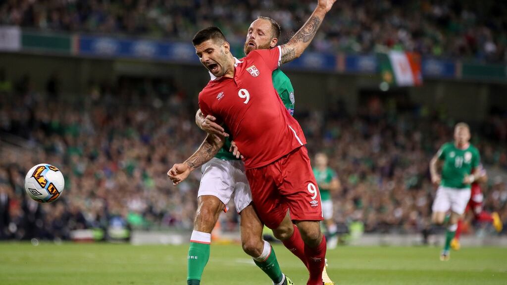 Ireland’s David Meyler in action against Serbia’s Aleksandar Mitrovic during the World cup qualifier at the Aviva Stadium. Photograph: James Crombie/Inpho