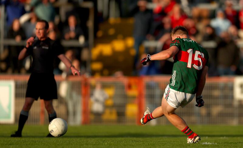 Mayo’s Ryan O’Donoghue scores a penalty. Photograph: James Crombie/Inpho