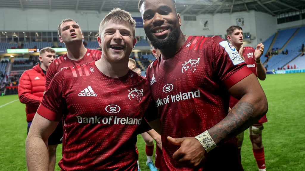 Munster’s Patrick Campbell celebrates after the Wasps win with Daniel Okeke. Photograph: Dan Sheridan/Inpho