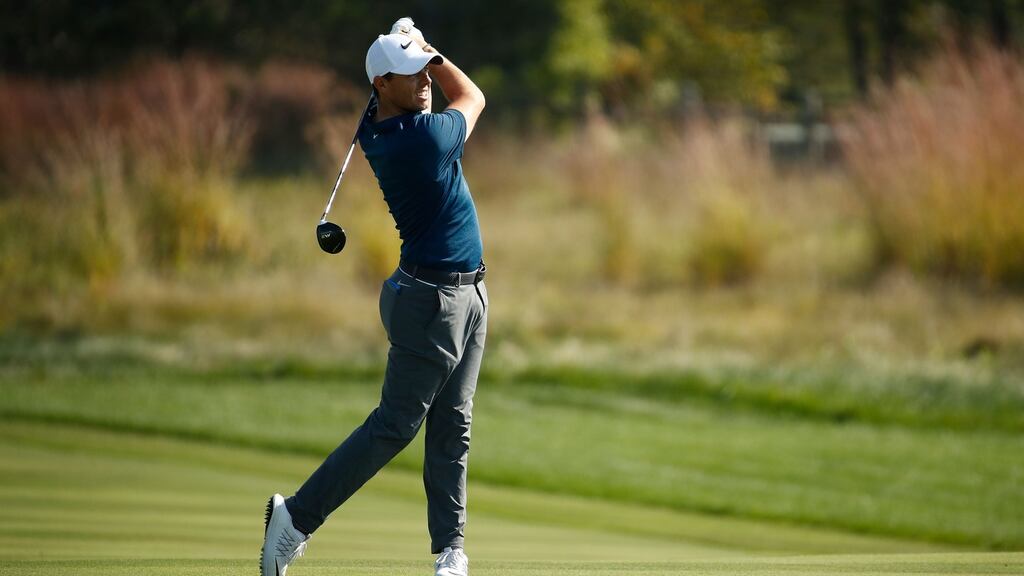 Rory McIlroy of Northern Ireland hits his second shot on the eighth hole during the third round of the BMW Championship at Conway Farms Golf Club in Lake Forest, Illinois. Photo: Andy Lyons/Getty Images