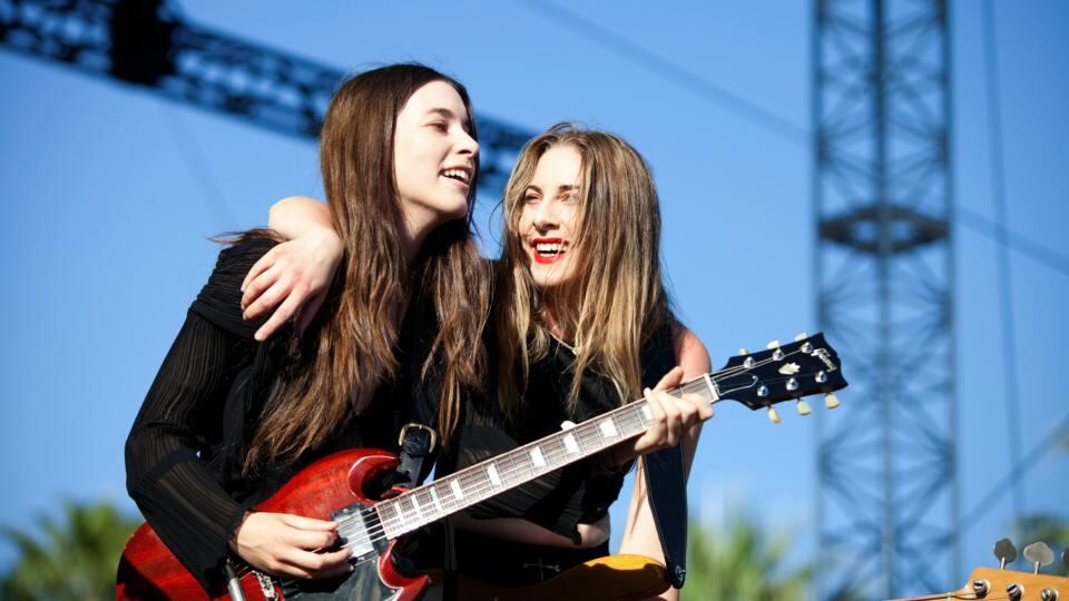 Two of the three HAIM sisters preform at Coachella Photograph: Emily Berl/ New York Times