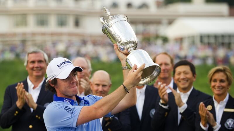 McIlroy holds aloft the US Open trophy after winning at Congressional in 2011. Photo: Getty Images