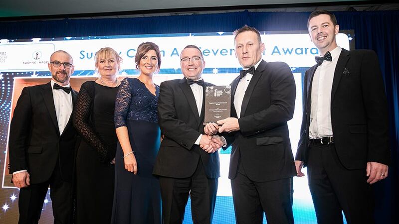 Aidan McCauley, Managing Director, Dawsongroup Ireland presents the Supply Chain Achievement Award to the Pfizer Ringaskiddy team.