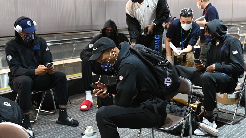 Damian Lillard and the US men’s basketball Olympic team wait in Narita international airport in Narita, Chiba prefecture. Photograph: Kazuhiro Nogi/Getty/AFP