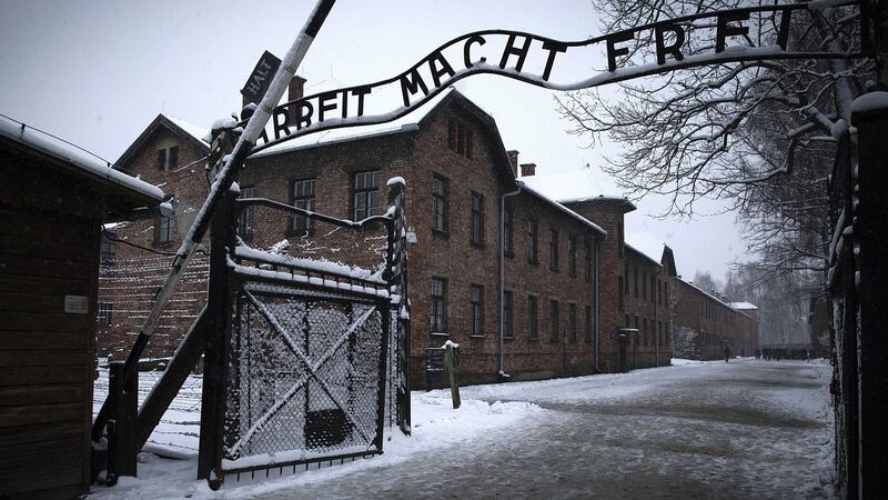The entrance to the former Nazi concentration camp Auschwitz-Birkenau with the lettering ‘Arbeit macht frei’ (‘Work makes you free’) in Oswiecim, Poland