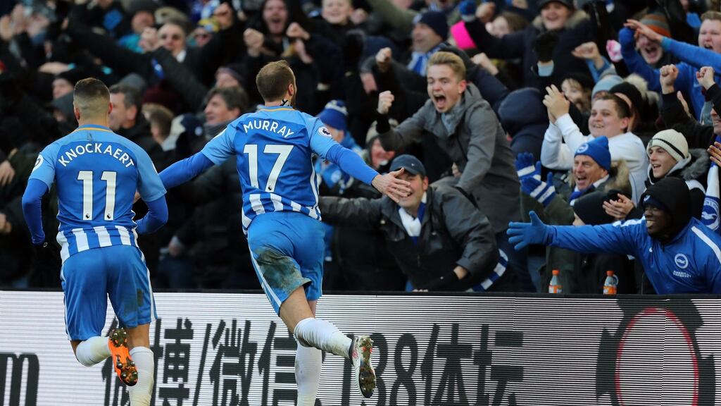 Brighton & Hove Albion’s Glenn Murray celebrates scoring the second goal for his side during their Premier League win over Swansea City at the AMEX Stadium, Brighton. Photo: Gareth Fuller/PA Wire