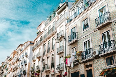 ‘We met our neighbour Maria on the balcony we share. The next day we find a ‘Portuguese lessons’ leaflet under our door.’ Photograph: iStock