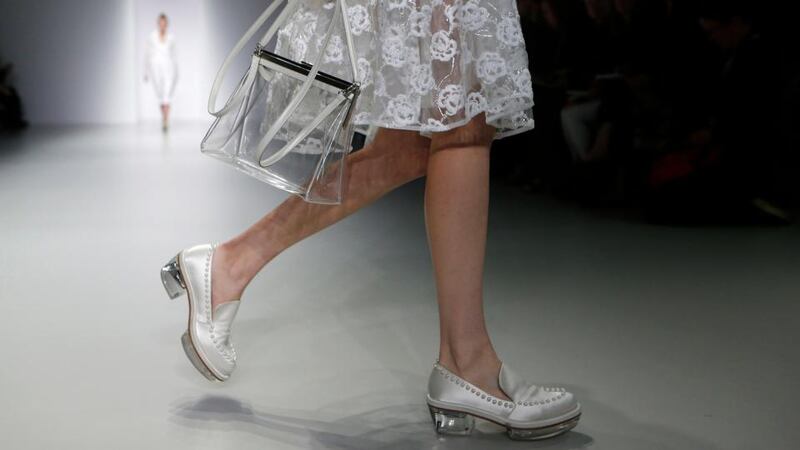 A model presents a creation from the Simone Rocha Spring/Summer 2014 collection during London Fashion Week yesterday.
