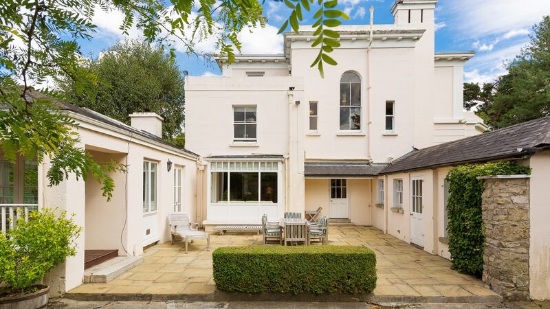 Side courtyard opening into the old stables