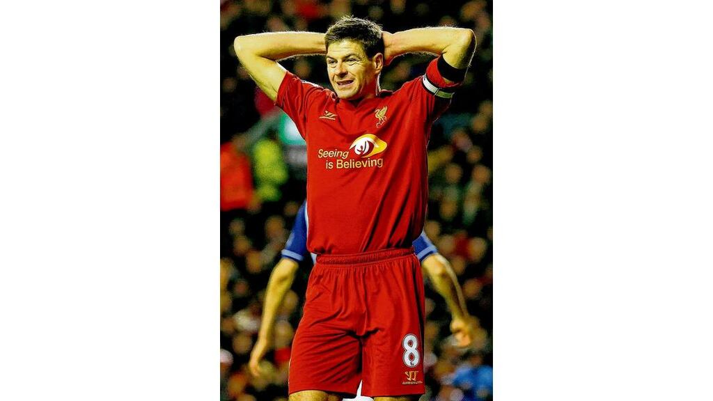 Liverpool captain Steven Gerrard shows his disappointment after his penalty miss against West Brom at Anfield last night. photograph: phil noble/reuters