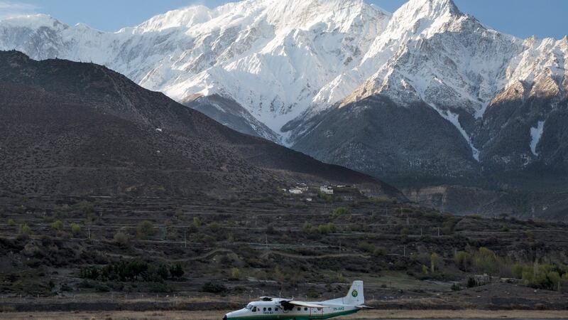 File photograph of a twin aircraft from the Tara Airlines landing at Jomsom Airport in Nepal, with Mount Nilgiri visible in the background. Photograph: EPA