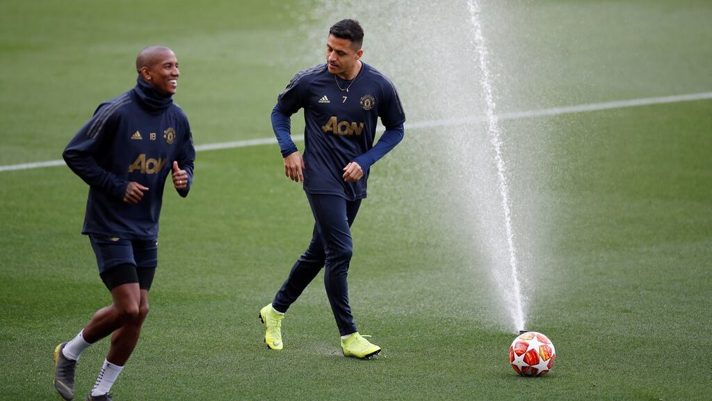 Manchester United’s Alexis Sanchez and Ashley Young during training at the Camp Nou in Barcelona. Photograph: Reuters/Carl Recine