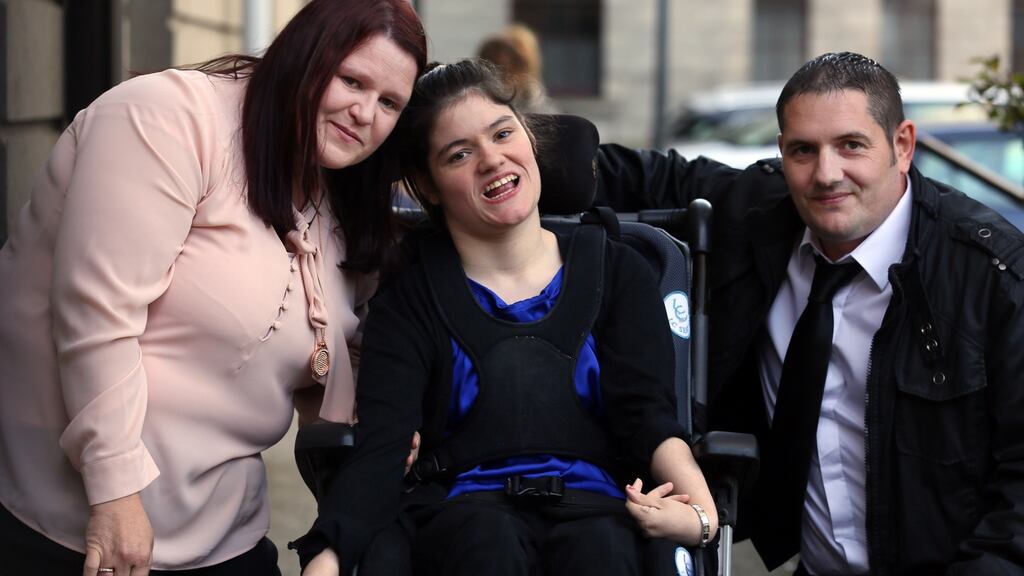 Nadine Wilkin with her parentsJudith Wilkin and Trevor Kincaid of Manorcunningham, Letterkenny, Co Donegal pictured leaving the Four Courts. Photograph: Courts Collins