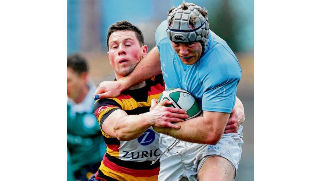 Lansdowne's John Cooney tackles Anthony Kavanagh of Garryowen during their AIL game on Saturday. Photograph: Inpho