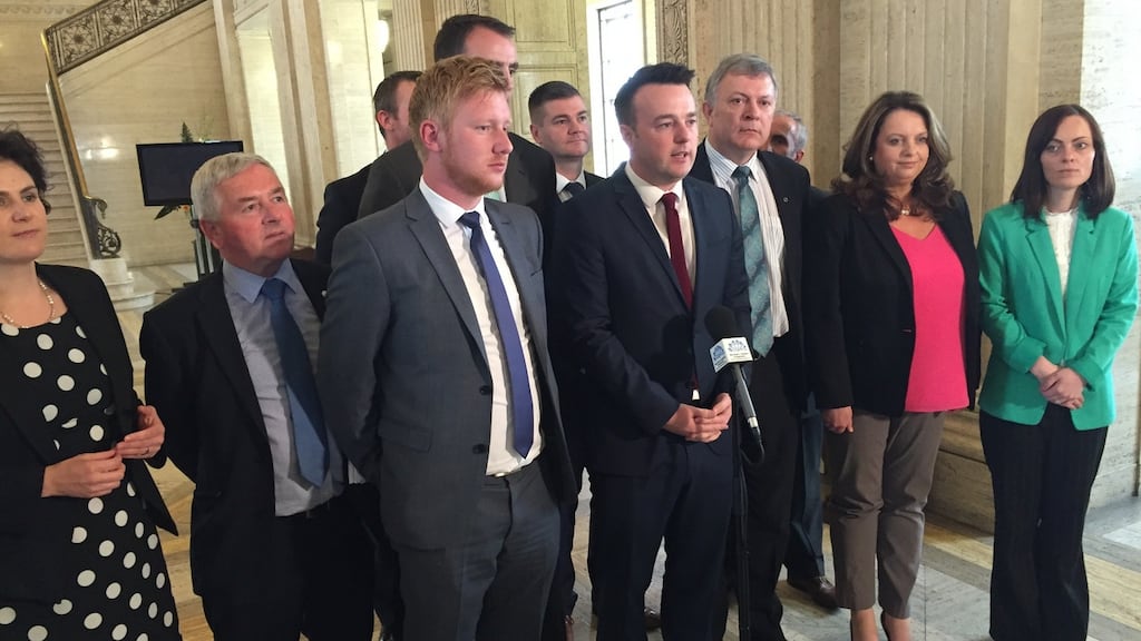 SDLP leader Colum Eastwood flanked by party colleagues as he addresses the media in Stormont after the  Executive was formed. Photograph: David Young/PA Wire