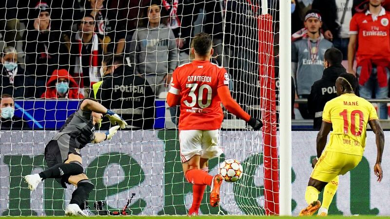 Sadio Mane scores Liverpool’s second goal during the Champions League quarter-final first-leg match against Benfica at the Estádio da Luz in Lisbon. Photograph: Adam Davy/PA Wire