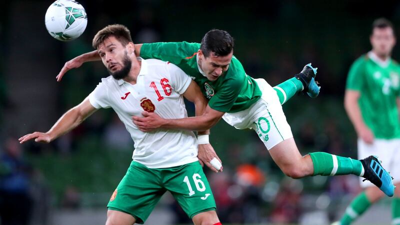 Kristiyan Malinov and Josh Cullen battle for the ball. Photo: Niall Carson/PA Wire