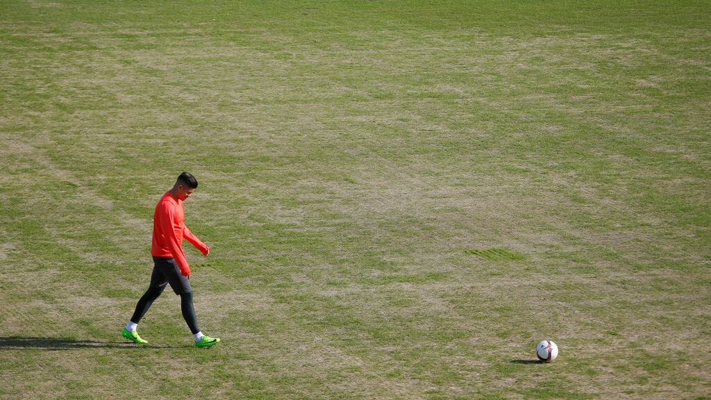 Manchester United’s Marcos Rojo on the Rostov pitch ahead of their Europa League clash last week. Photo: Maxim Shemetov/Livepic