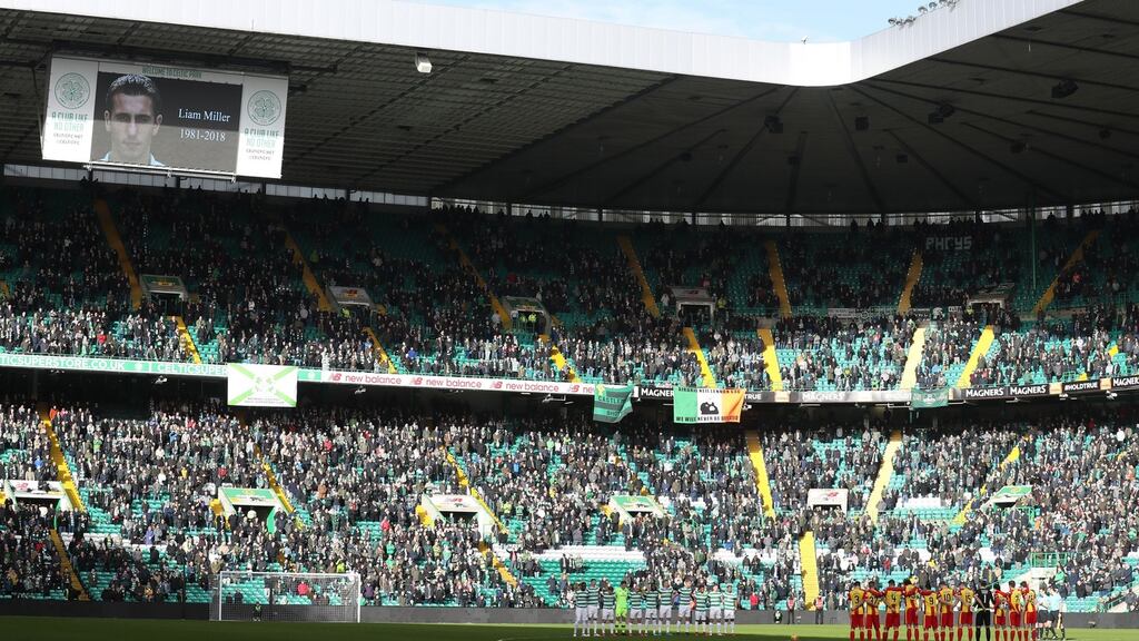 Players and fans stand for a minute’s silence in memory of Liam Miller before  the  Scottish Cup, fifth round match at Celtic Park. Photograph:  Andrew Milligan/PA Wire