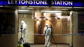 London Tube stabbing: Police search house amid terror link
